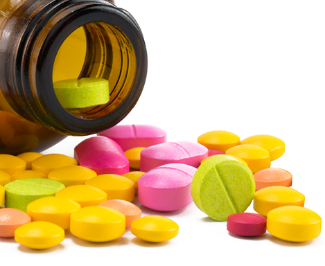 Bottle with colored tablets